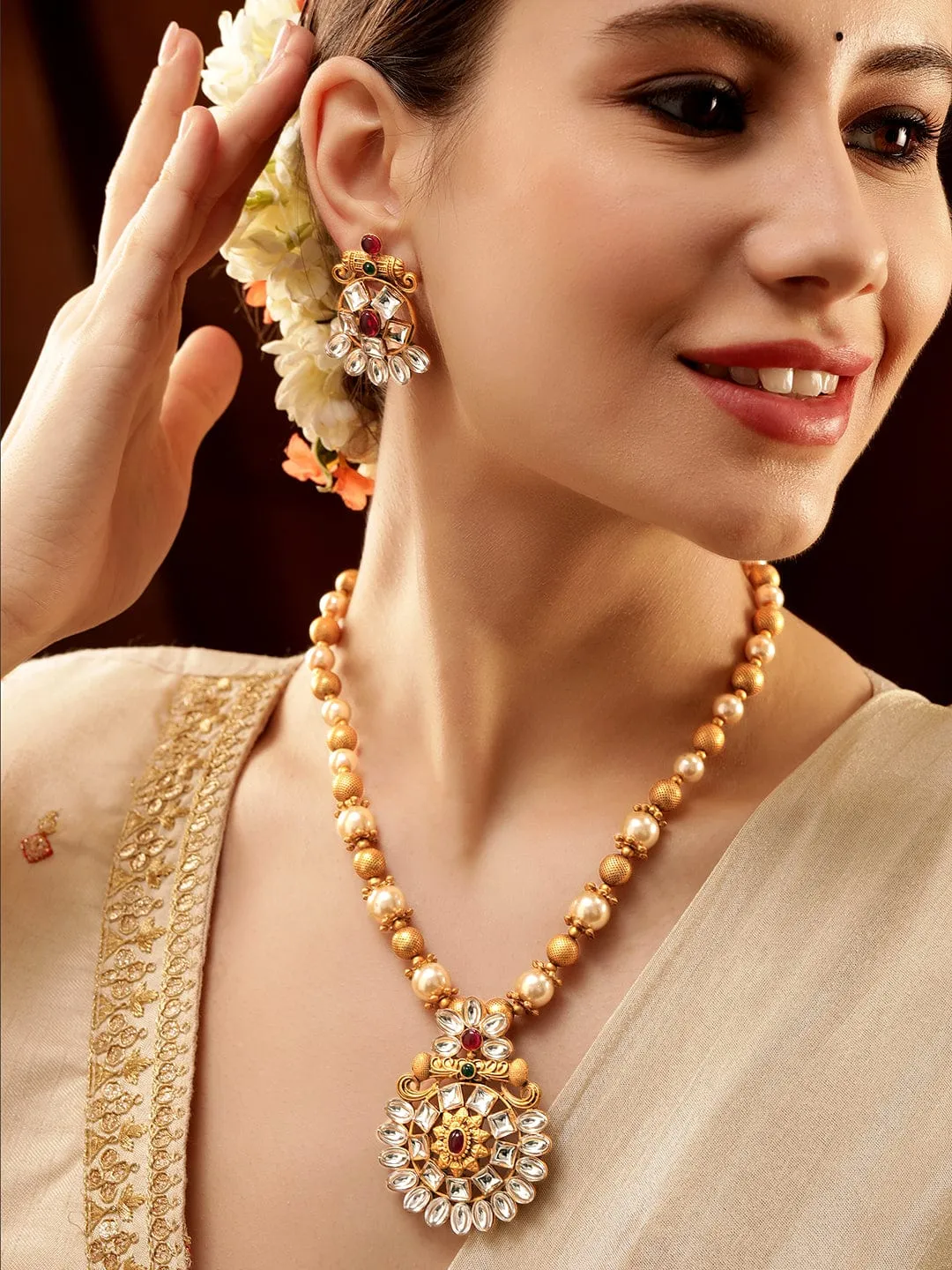 Rubans Gold-Toned Pendant with Dazzling Stones and Golden Off-White Pearls Chain Necklace Set